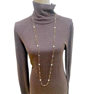 Vintage antique gold tone & faux pearl long necklace
Oval textured links 25 in.